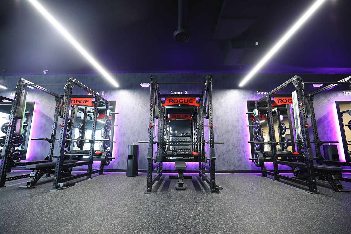 A photo of Train's training lanes in Mclean, VA featuring a Rogue Fitness squat rack